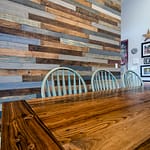 reclaimed wood wall and dining table